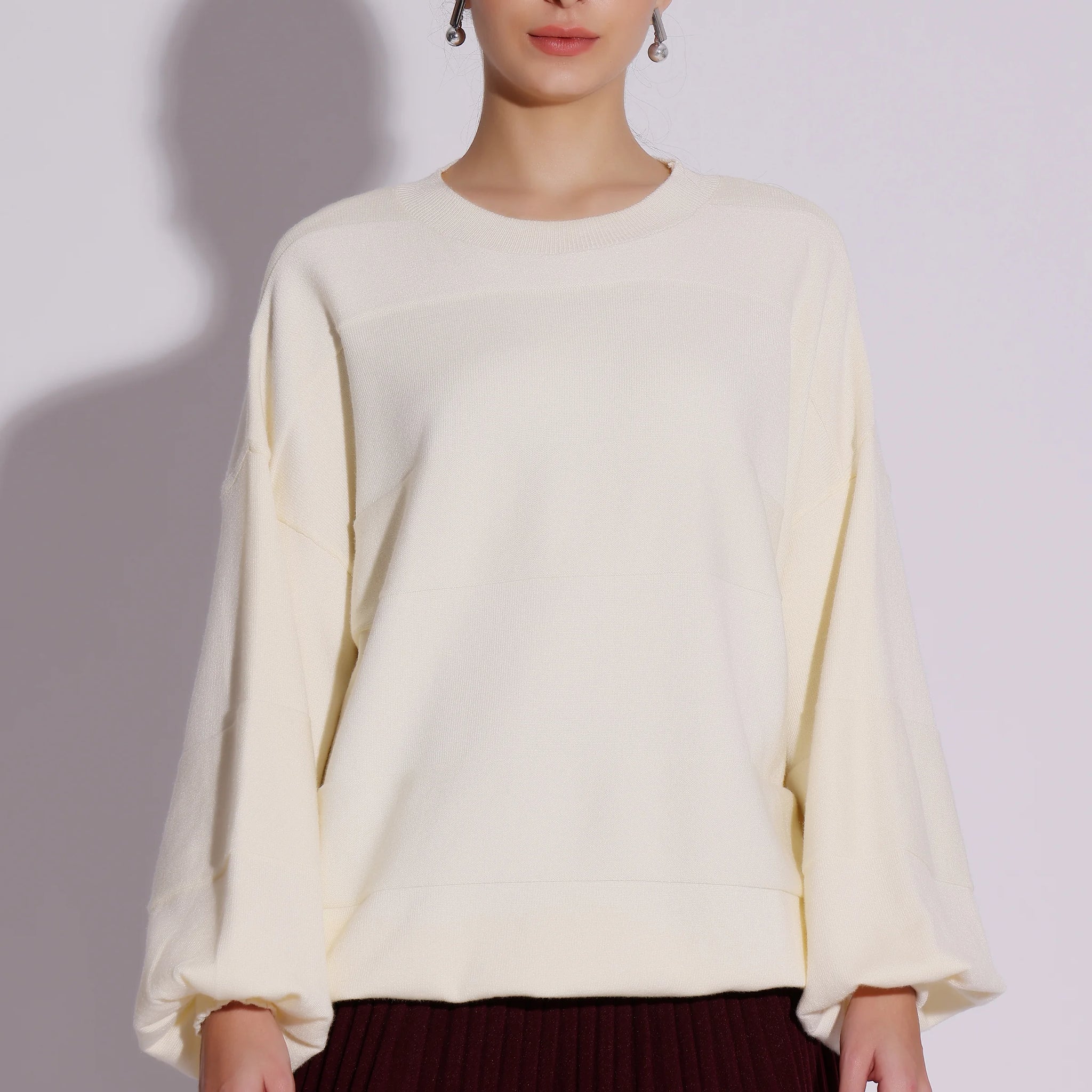 Elegant Cream Sweater with Burgundy Accents